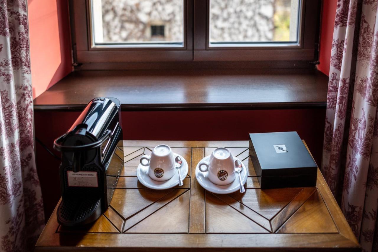 Hotel Grodek Krakow Exterior photo A Nespresso machine in a hotel room