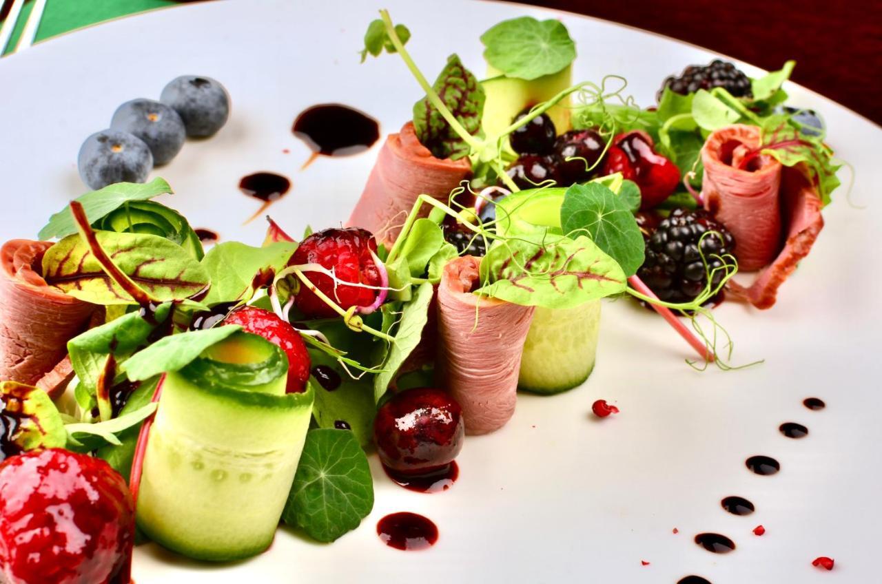 Hotel Grodek Krakow Exterior photo A salad with ham and berries